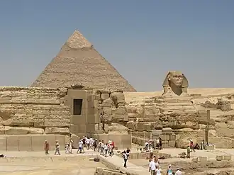 Tourists at the pyramid complex of Khafre near the Great Sphinx of Giza